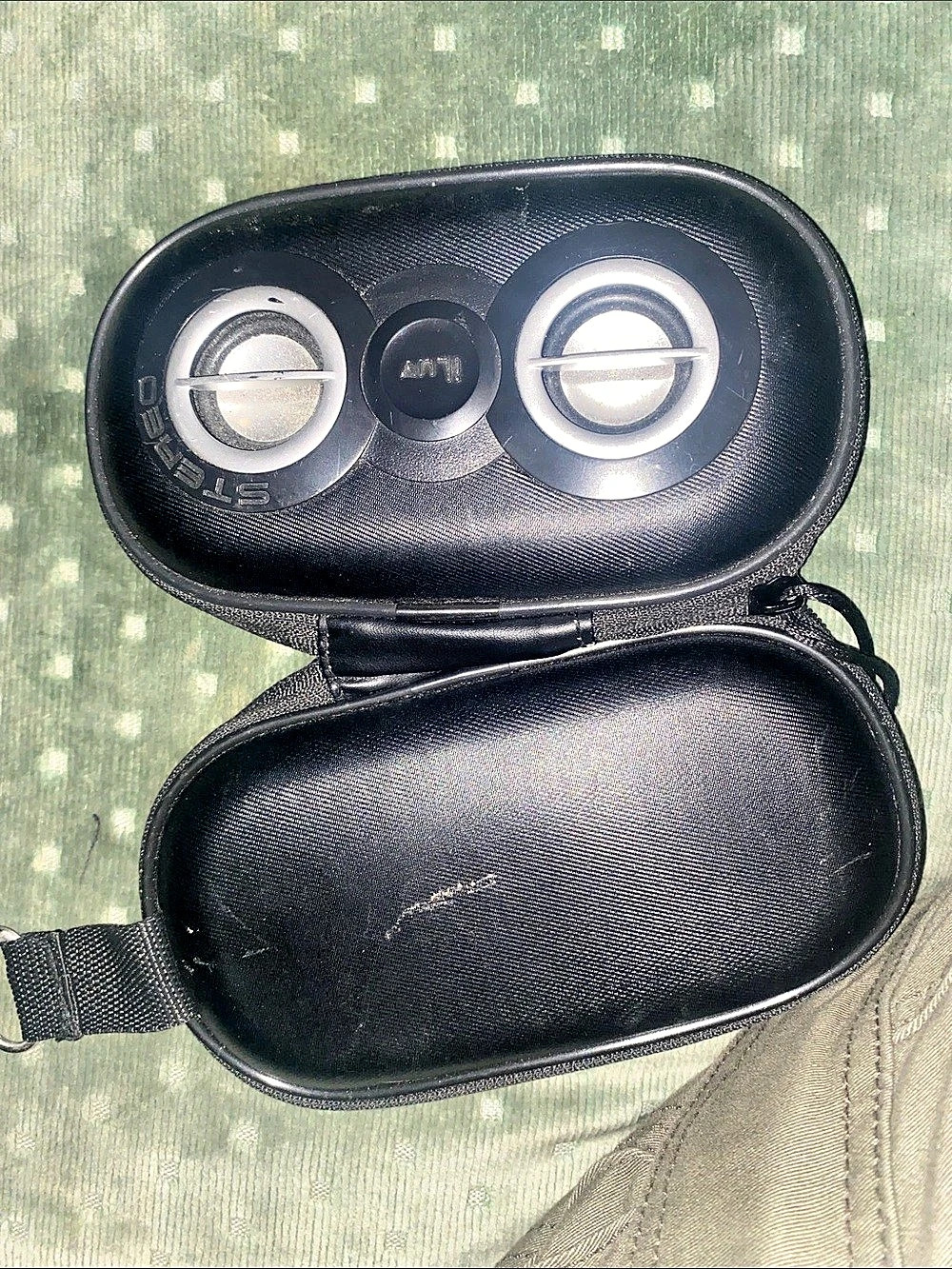 Portable speaker in carrying case in black
